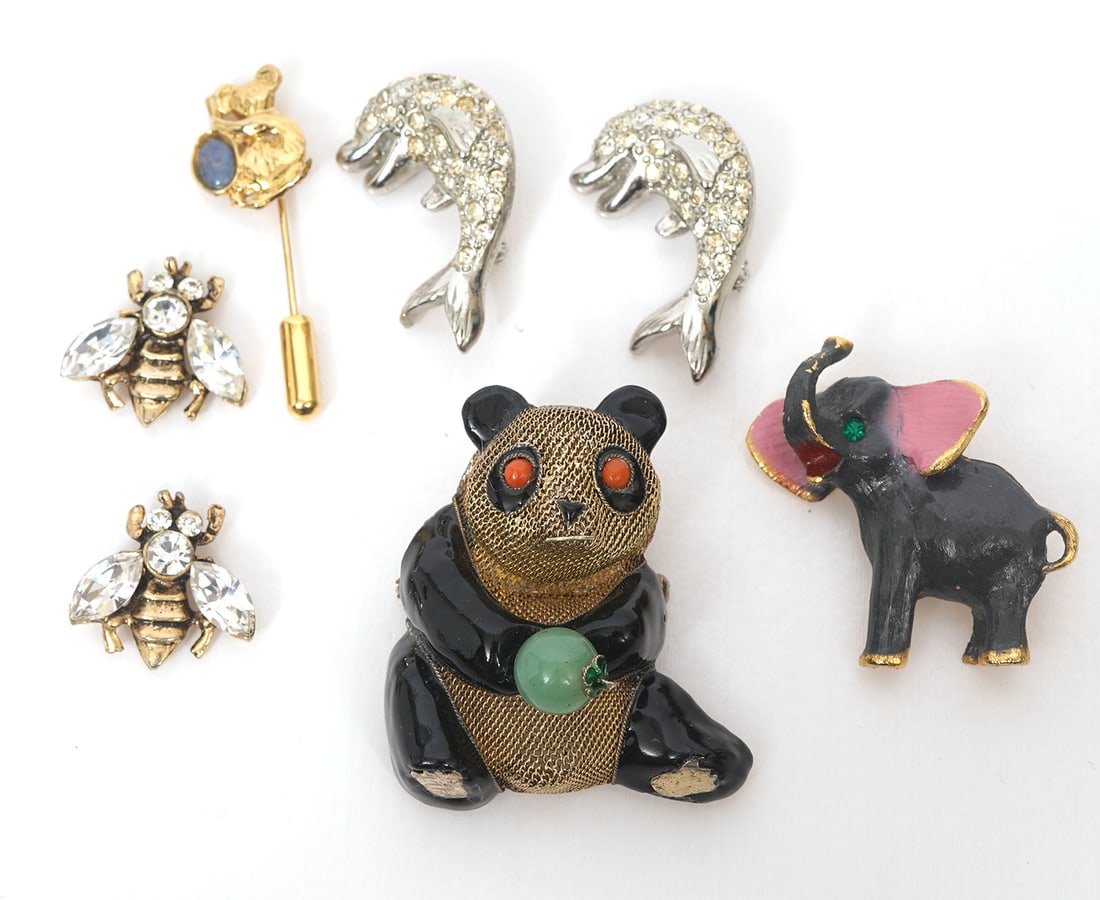 Group of 7 Animal Pins: Group of 7 animal pins includes an Enamel elephant pin (1.25"); Koala stick pin (1.75"); 2 Dolphins with rhinestones (1.25"); 2 Rhinestone bee pins (0.75"); Silver mesh enamel with Jade and coral pand