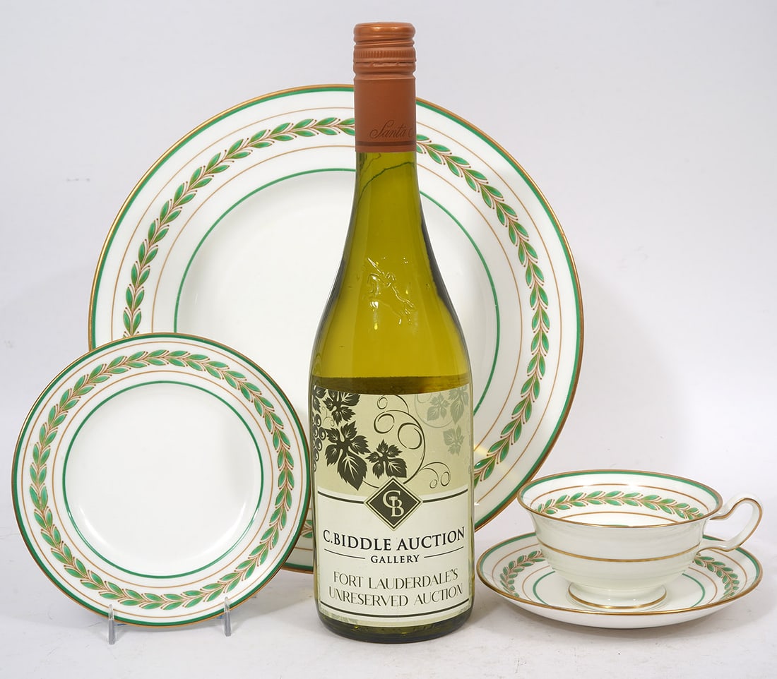 47 Pcs. Wedgwood China Dinnerware: 47 pieces of Wedgewood China Dinnerware marked on underside 'Wedgewood Bone China, Made in England, J4 W3806'. All pieces have green laurel trim and gold rims. This lot includes 11 dinner plates (10.7