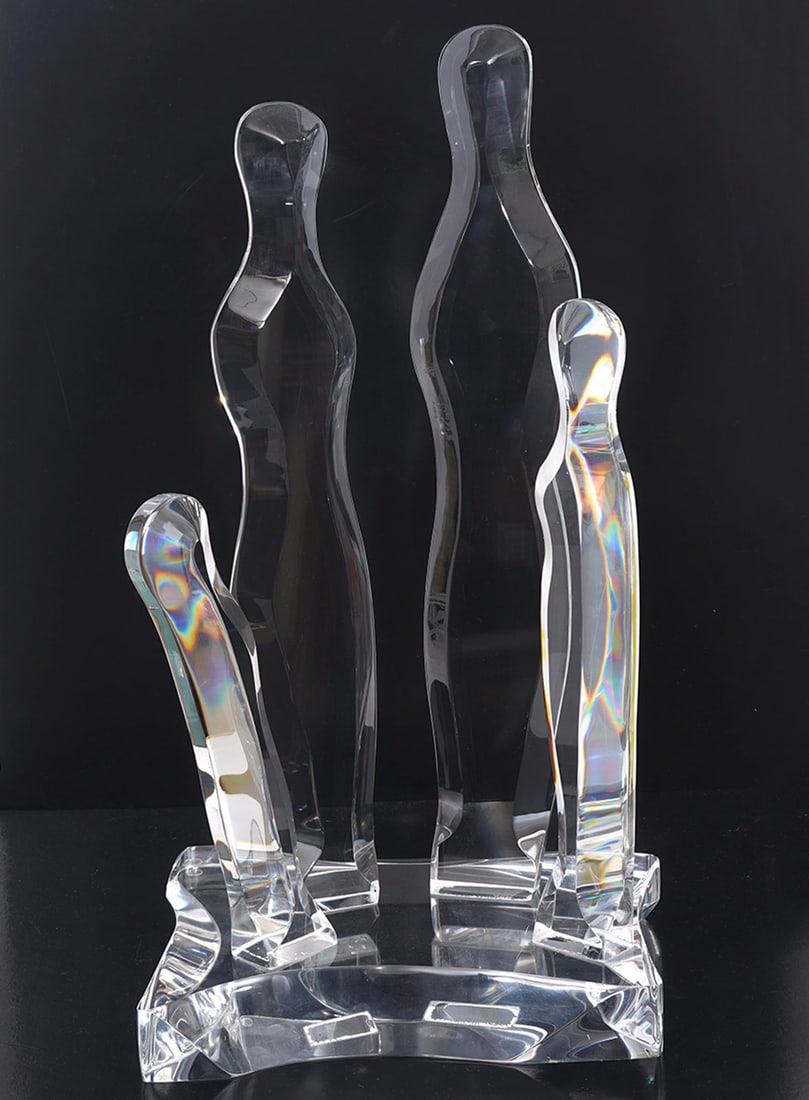 Lucite Four Figure Sculpture: Lucite unsigned four figure free form sculpture on angular base in the style of Van Teal. Measures 23.75"H; base 12.5"L x 8.75"W x 2"H. Condition report: good condition, please see all photos. Contact