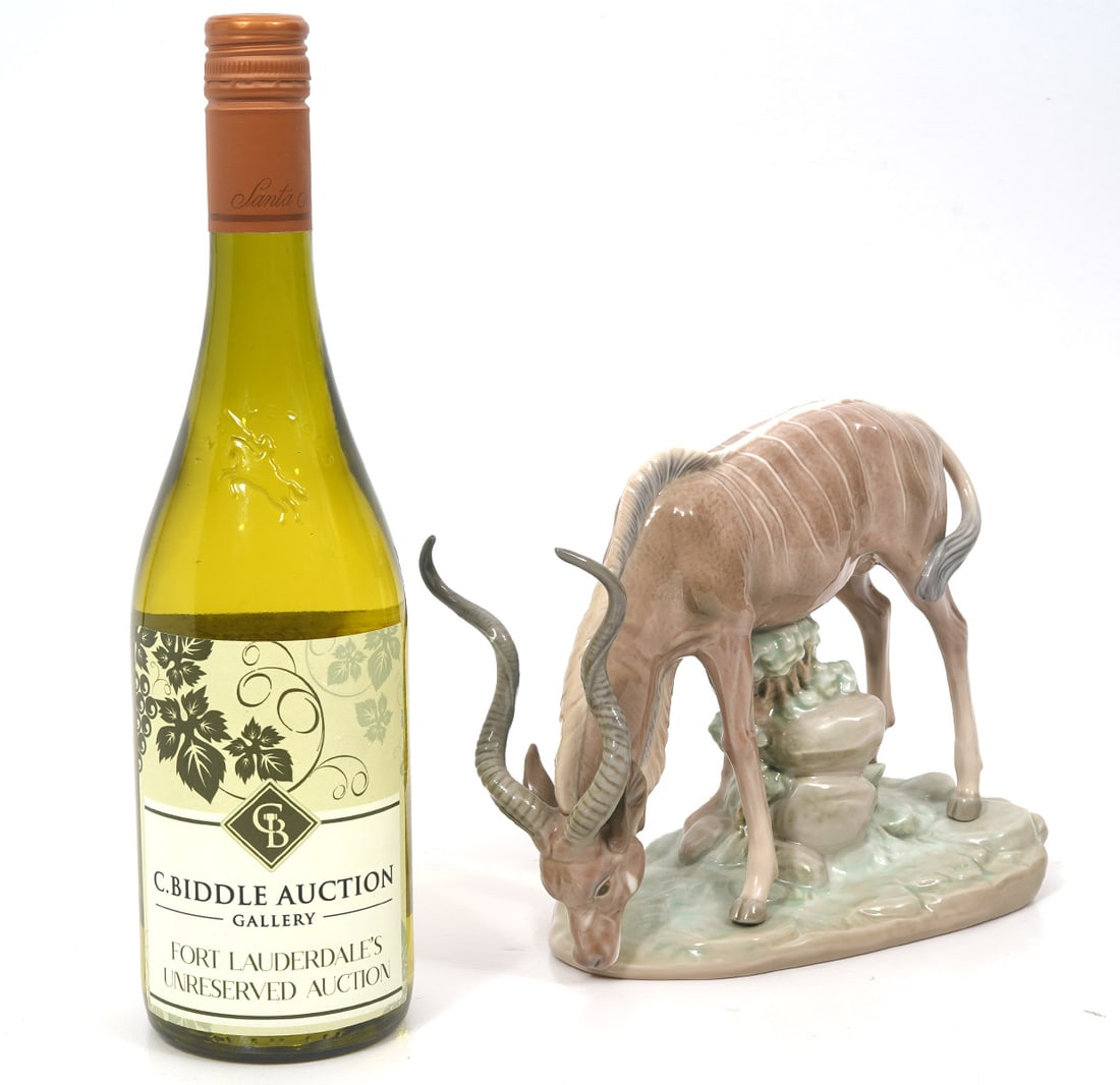 Lladro Porcelain Figure of "Antelope Drinking": Lladro "Antelope Drinking" porcelain figure, #5302. Measures 9"L x 4.25"W x 7"H. Condition report: Good condition, please examine all photos closely. Contact C. Biddle Auction Gallery for more detaile