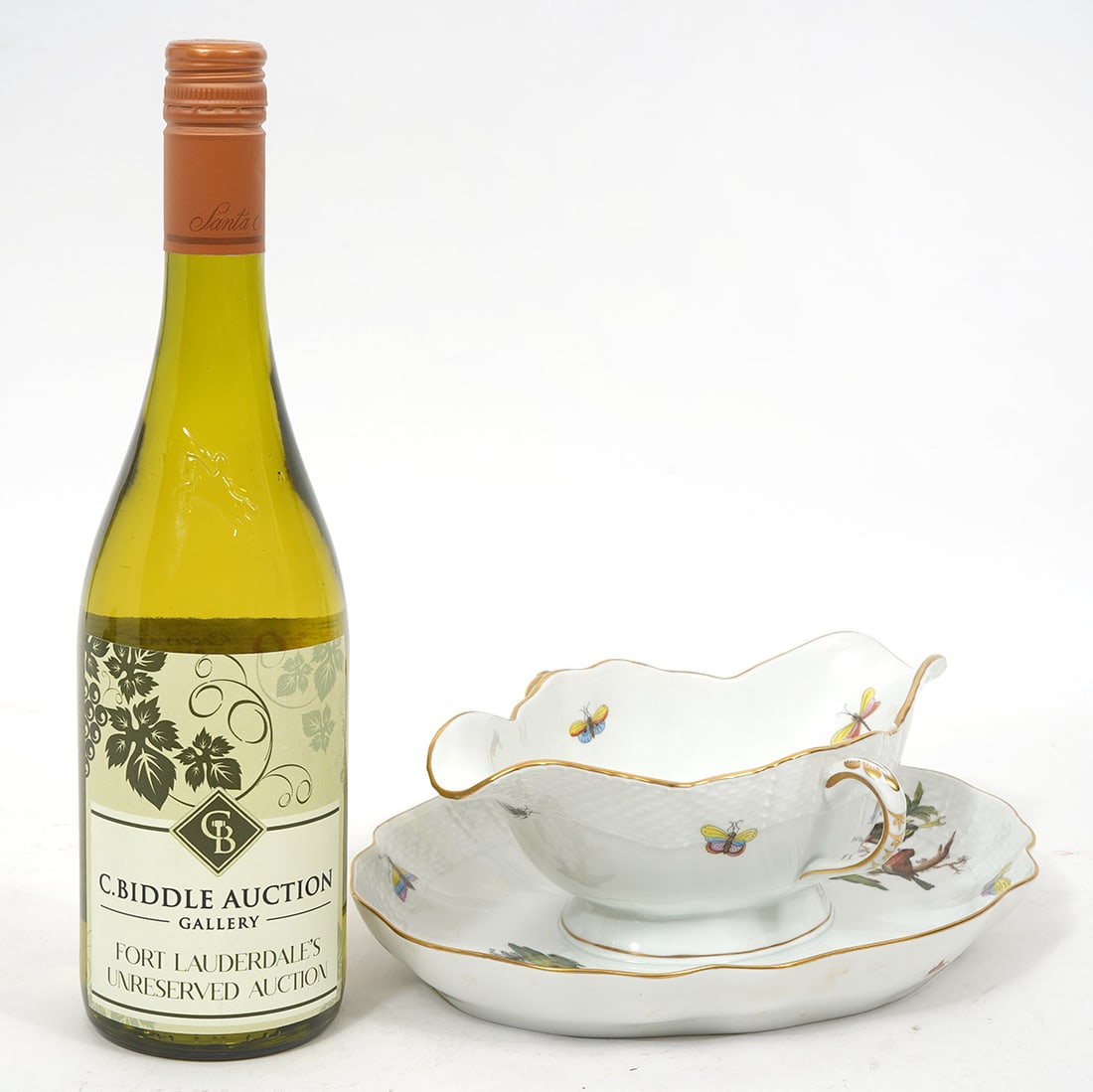 Herend Porcelain 'Rothschild Bird' Gravy Boat: Large Herend Porcelain 'Rothschild Bird' gravy boat features bird and butterfly illustrations and gilt edges. Measures 10"L x 8"W x 3.5"H. Condition report: Good condition, please examine all photos c