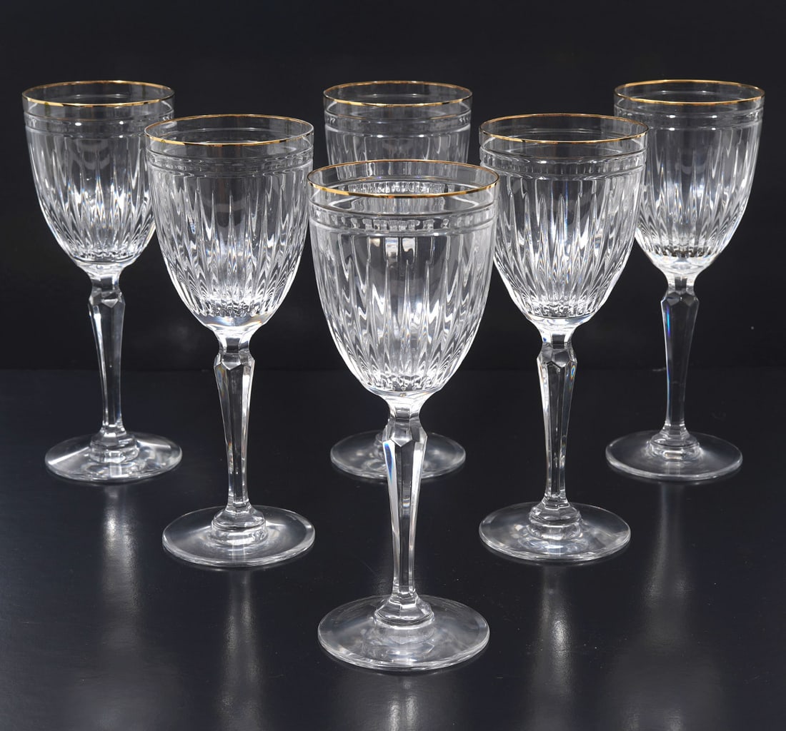 6 Waterford Crystal Hanover Gold Water Goblets: 6 Waterford Crystal Marquis Hanover Gold Water Goblets with ribbed bodies and gold trimmed rims. Measures 8.75"H. Condition report: good condition, please see all photos. Contact C. Biddle Auction Gal
