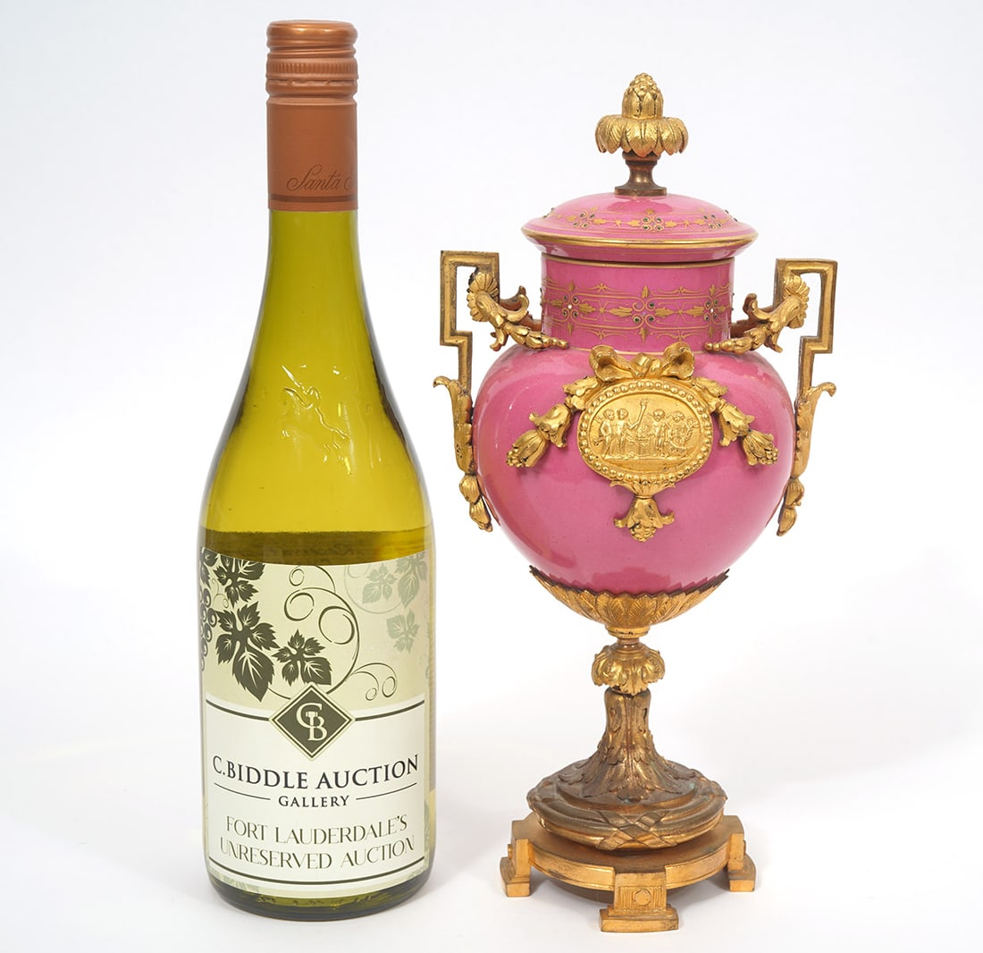 French Pink Porcelain Gilt Bronze Garniture Urn: French pink porcelain gilt bronze garniture urn, features sculptural Neo-Classical elements and four foot pedestal base. Measures 11.5"H x 5.5"W. Condition report: Good condition, please examine all p