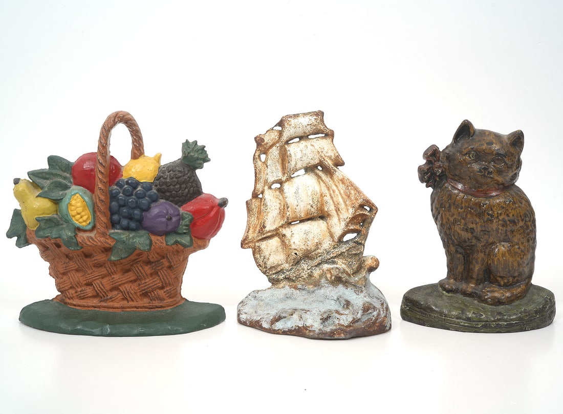 Three Painted Cast Iron Door Stops (1 of 4)