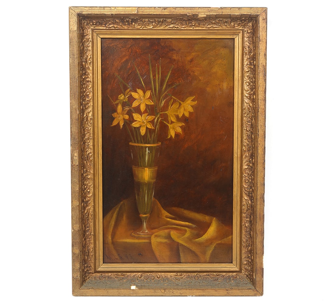 Still Life Painting Oil on Board: Still life oil on board features a vase of flowers on a table, draped with a cloth. Signed lower left 'M. L. S. 93' and mounted in carved gilt wood frame. Measures 22.5"H x 15"W framed; 18"H x 10.25"W
