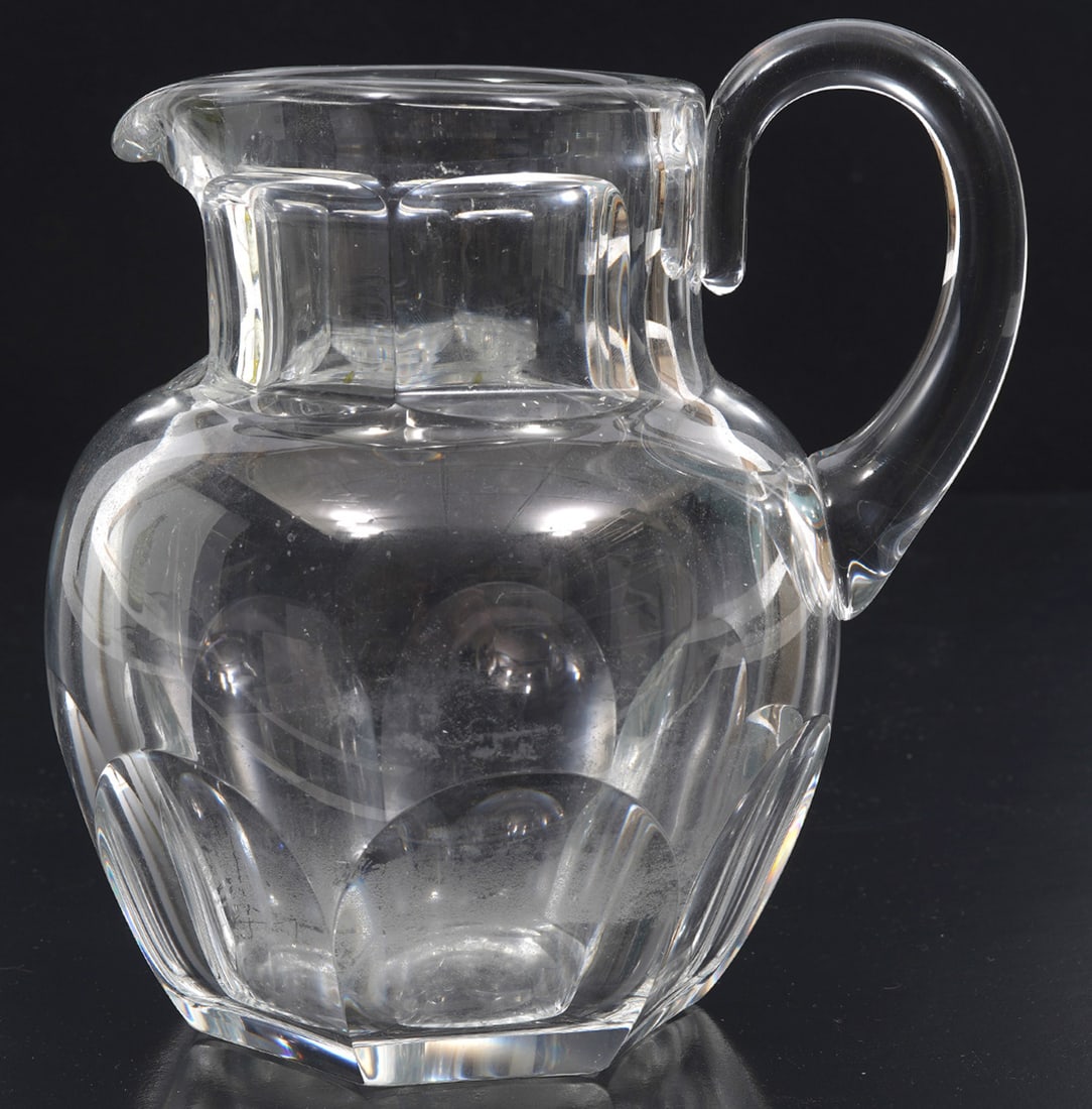 Baccarat France Cut-Crystal Pitcher: Baccarat France cut-crystal pitcher measures 6.25"H x 6"W. Condition report: Good condition, please examine all photos closely. Contact C. Biddle Auction Gallery for more detailed information. C. Bidd