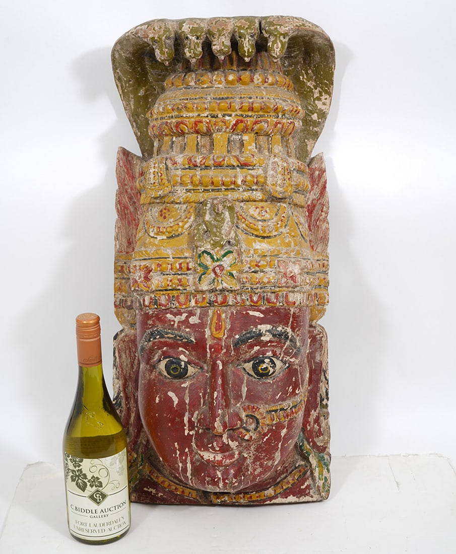 Antique Tibetan Carved Wood Tribal Mask: Antique Tibetan carved wood tribal mask measures 24.25"H x 11.5"W x 6.75"D. Condition report: wear to surface consistent with age and use, small crack on the base, please see all photos. Contact C. Bi