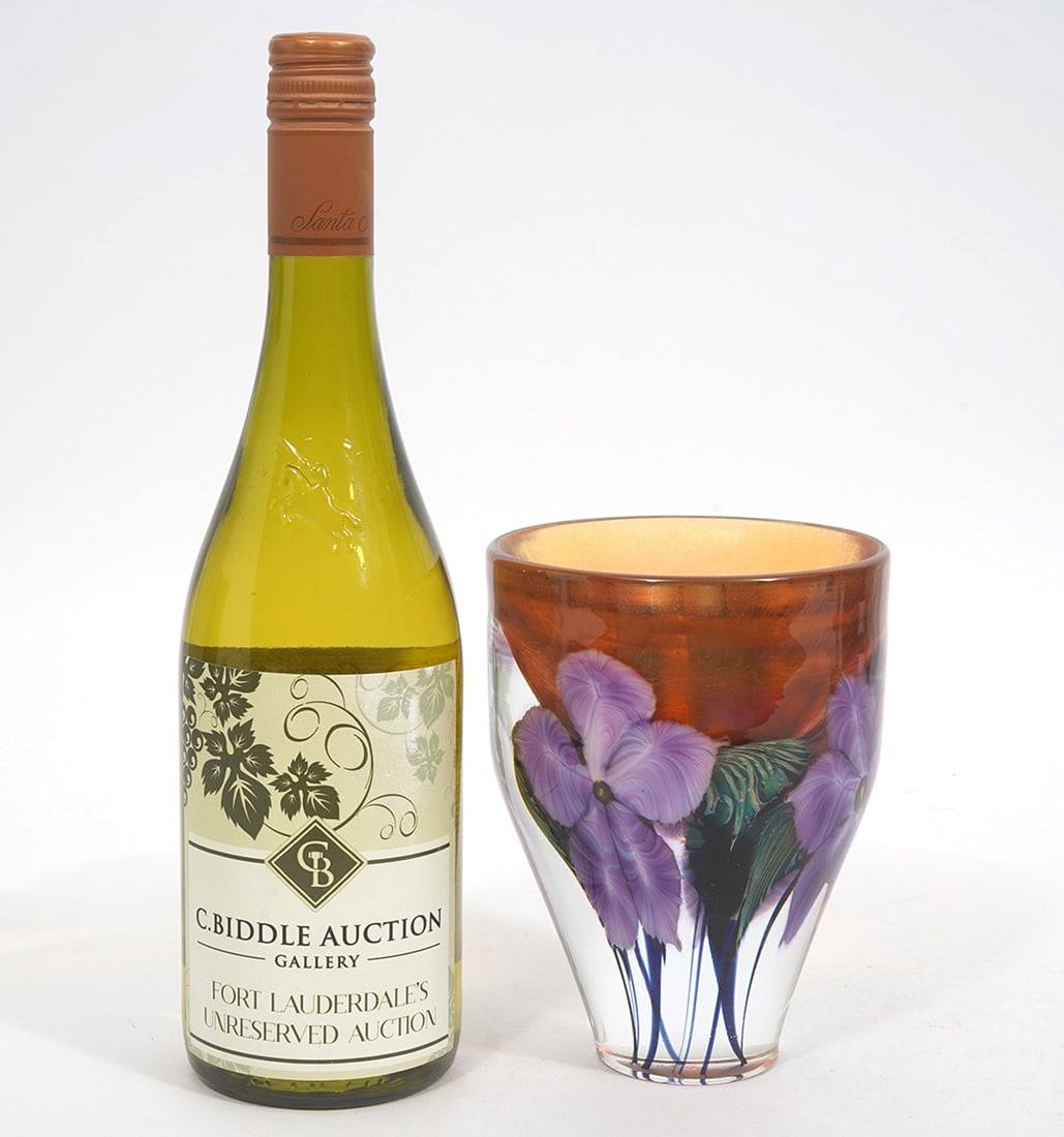 David Lotton Signed Purple Flowers Vase: David Lotton signed art glass vase decorated with purple flowers. Measures 6"H x 4.5"W. Condition report: Good condition, please examine all photos closely. Contact C. Biddle Auction Gallery for more 