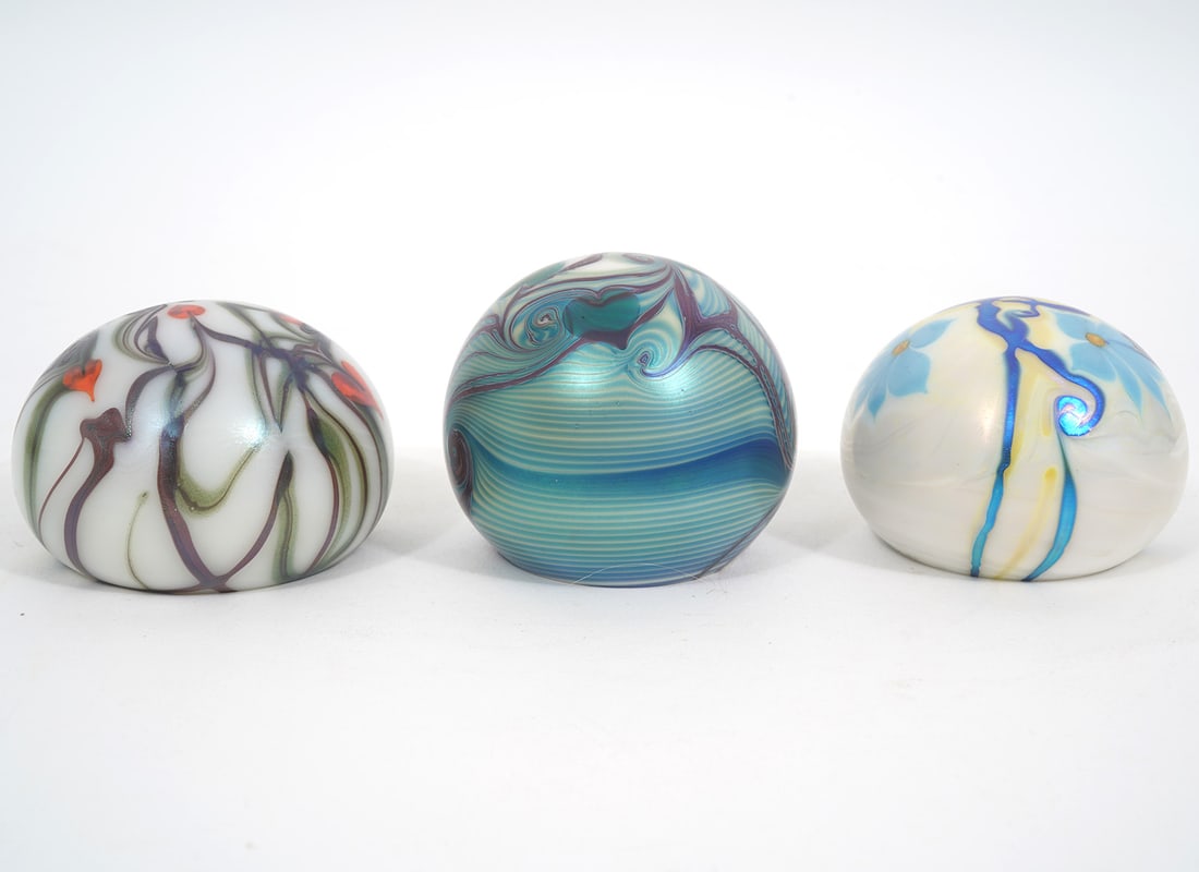 Three Orient & Flume Marbled Style Paperweights: Three Orient & Flume paperweights with marbled-style floral motif. Each measures approx. 3" in diameter and are signed underside. Condition report: Good condition, please examine all photos closely. C