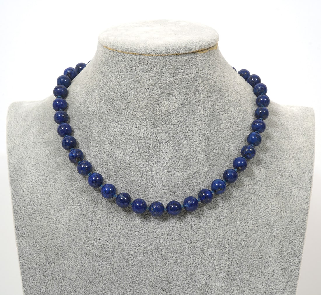 Lapis Lazuli Beaded Necklace 14K YG Clasp: Lapis lazuli beaded necklace with 14K yellow gold filigree clasp. Beads are approx 10mm. Condition report: Good condition, please examine all photos closely. Contact C. Biddle Auction Gallery for more