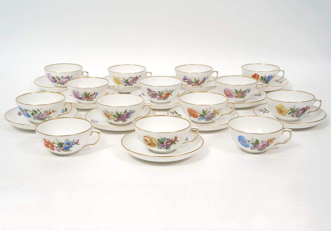 Royal Copenhagen "Saxon Flower" 14 Cups 12 Saucers: Royal Copenhagen "Saxon Flower" Danish porcelain, 14 tea cups (4.5"W) and saucers (5 7/8"W). Condition report: Good condition, please examine all photos closely. Contact C. Biddle Auction Gallery for