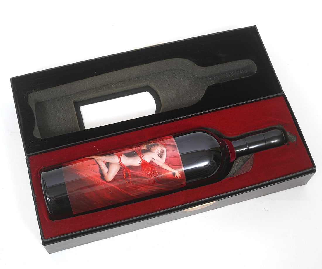Marilyn Monroe Red Wine Velvet Collection: Marilyn Monroe Red Wine Velvet Collection in custom box features a magnum of collectable wine from Napa Valley with a portrait of Marilyn Monroe by photographer Tom Kelley on the front. The bottle com