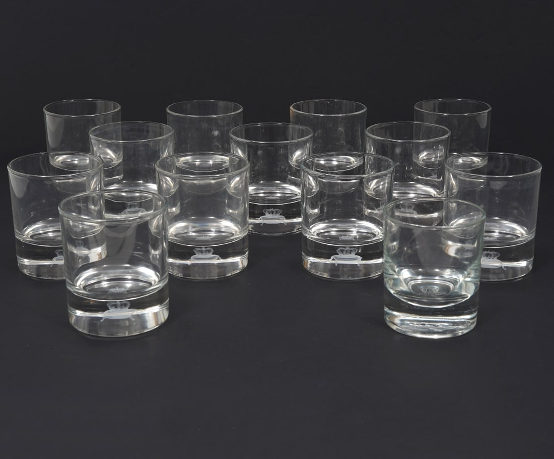 13 Crown Royal Whiskey Hologram Logo Glasses: 13 Crown Royal Whiskey glasses with floating 3-D hologram logo of crown on pillow. Includes one extra with different embossed logo. Each measures 3.75"H x 3.25"W. Condition report: Good condition, ple