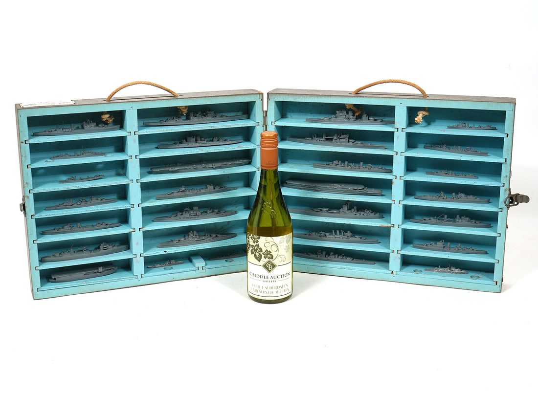 Framburg & Co. Miniature Cased British Navy Ship Models: Framburg & Co. British Navy ship models in wood case. Measures - 17"L x 13"W x 4"D (Closed). Condition report: Good condition, please examine all photos closely. Contact C. Biddle Auction Gallery for