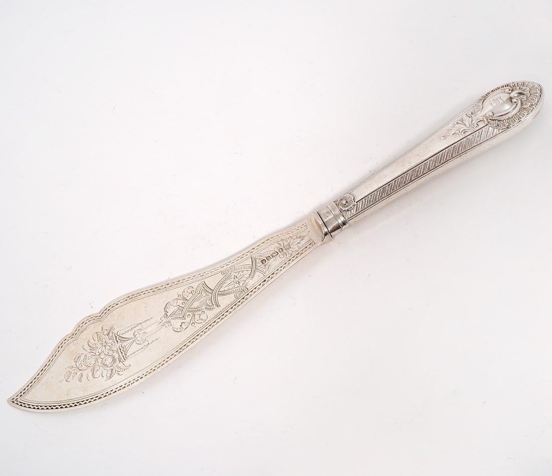 English Sterling Silver Engraved Fish Knife: English sterling silver fish knife features engraved floral arrangements on blade. Hallmarked "J.F J.S" with other English crown and lion hallmarks. Measures 13"H long. Weight - 191.3g. Condition repo