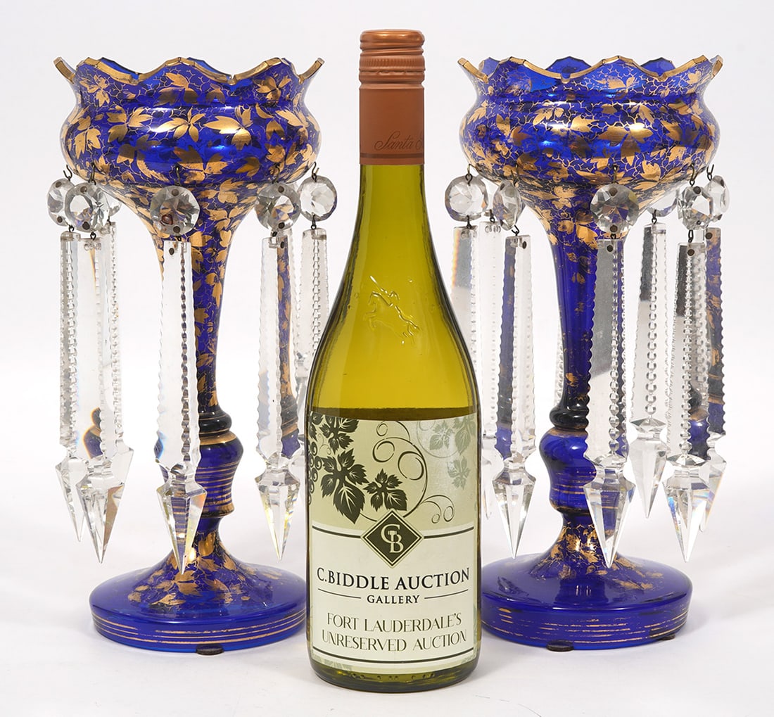 Pair Bohemian Cobalt Blue Mantle Lusters: Pair Bohemian cobalt blue mantle lusters features hand-painted gold foliage over blue glass and eight clear hanging crystals. Each measures 11"H x 5"W. Condition report: Some missing gold paint and ch