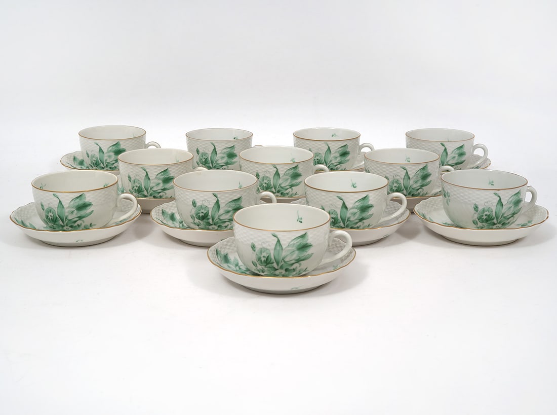 Herend "Chinese Bouquet Green" 12 Tea Cups Saucers: Herend "Chinese Bouquet Green" porcelain group includes, 12 tea cups and 12 matching saucers. Condition report: Good condition, please examine all photos closely. Contact C. Biddle Auction Gallery for