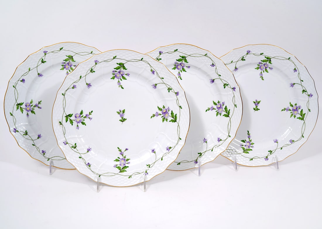4 Herend Imola Flower Lilac 11" Plates: Four Herend #1527 Imola Flower. Marked on bottom measure 11"W. Condition report: no chips, minor wear, please see all photos. Contact C. Biddle Auction Gallery for more detailed information. C. Biddle