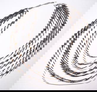 Multi Strand Beaded Necklace: Multi strand black and silver beaded necklace measures 21"L and hangs 21" down. Condition report: good condition, please see all photos. Contact C. Biddle Auction Gallery for more detailed information