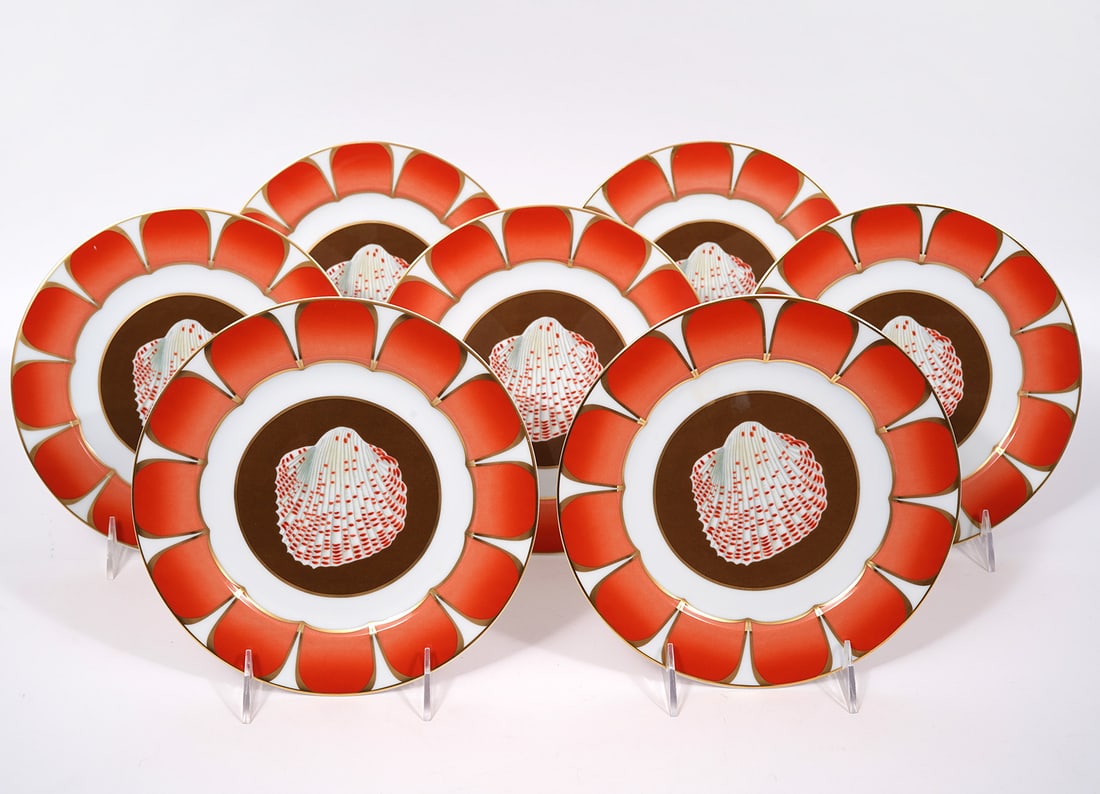 7 Lynn Chase "Coquilles" Strawberry Cockle Plates: 7 Lynn Chase "Coquilles Des Mers", strawberry Cockle version, porcelain salad/dessert plates (8.25"W). Part of a series of sea-life themed porcelain-ware to benefit the Chase Wildlife Foundation. Cond