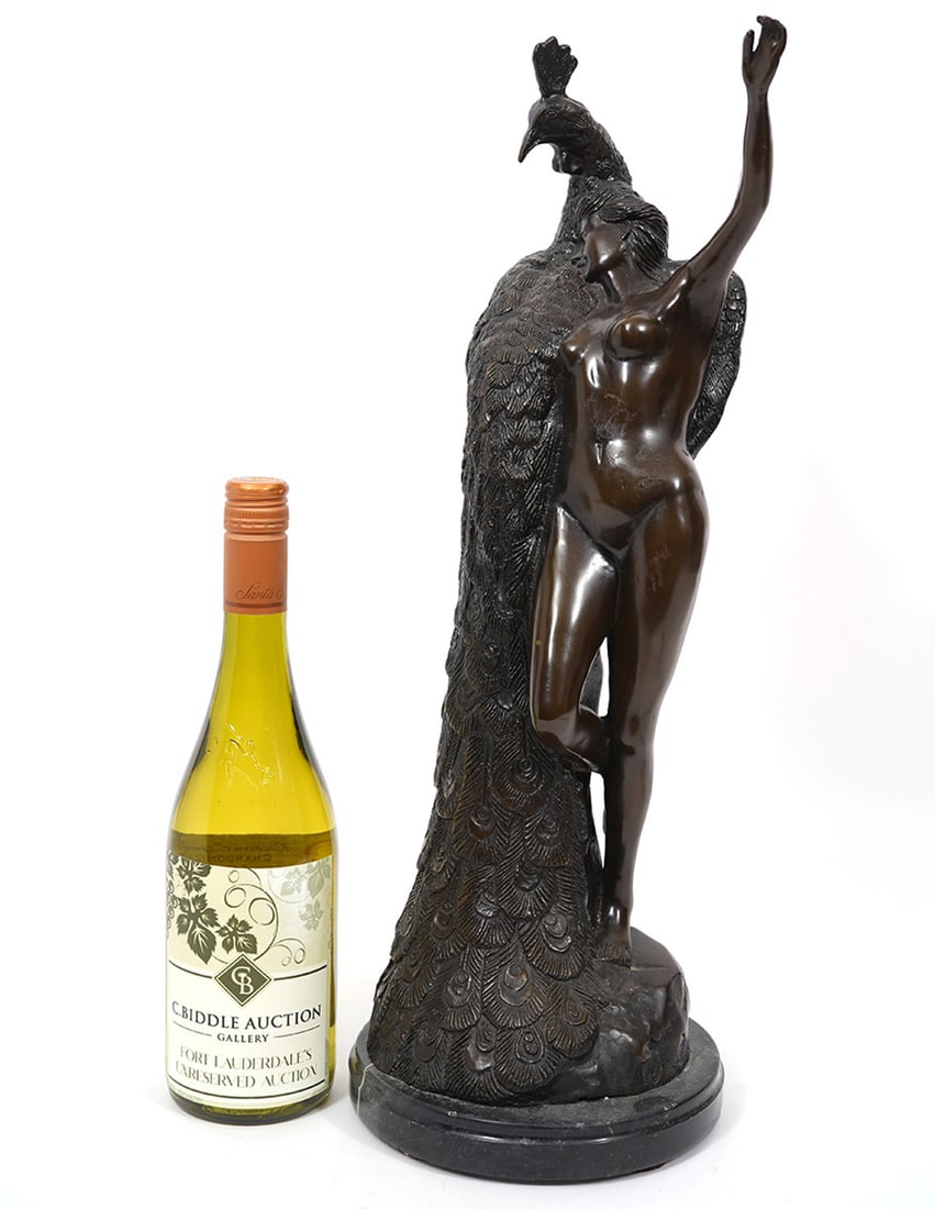 Continental Bronze Sculpture Nude Woman & Peacock: Continental bronze sculpture of a nude woman with peacock, unsigned. Mounted on round white-veined marble base. Measures 20"H x 7"W. Condition report: Good condition, very minor chips to marble, pleas