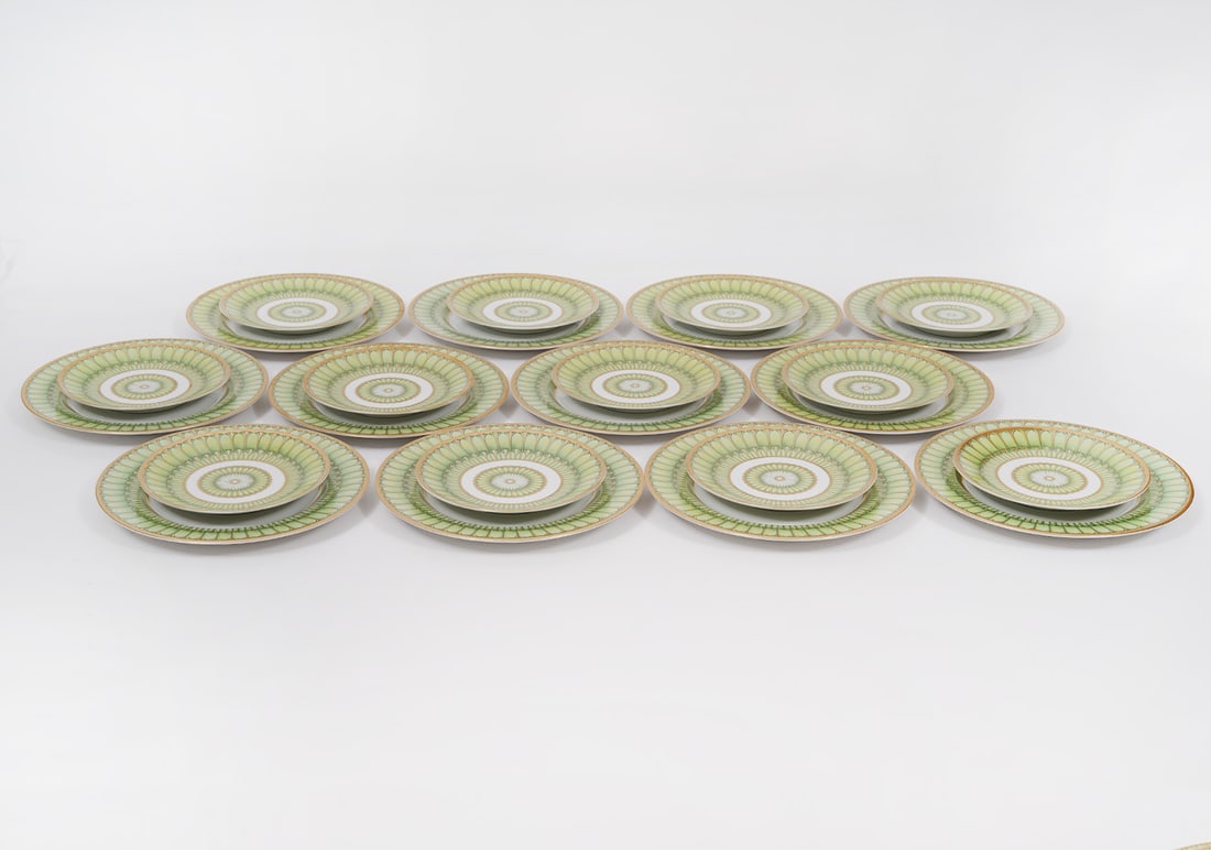 Philippe Deshaulieres 'Arcades Green' Plates: Philippe Deshaulieres French porcelain plates in 'Arcades Green' in green & gold geometric panels with gold trim includes 12 salad/dessert plates (8.5"W) and 12 bread & butter plates (6"). Marks on ba