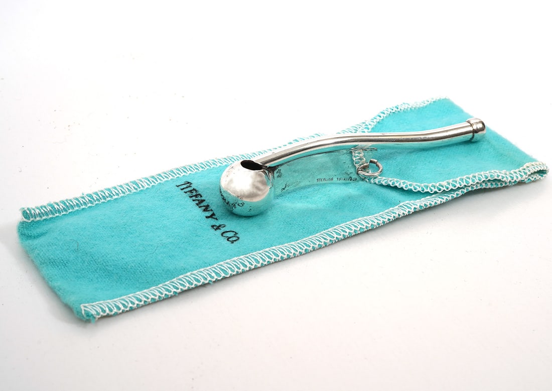 Tiffany & Co Sterling Boatswain's Whistle: Tiffany & Co sterling silver boatswain's whistle , includes fabric sleeve. Measures - 3.5"L. Weight - 11.6g. Condition report: Common wear for age and use, please examine all photos closely. Contact C