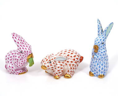 3 Herend Porcelain Fishnet Rabbits: 3 Herend porcelain rabbits with 24K gold accents includes a blue fishnet rabbit #15338 (3.5"H x 1.5"D x 1.25"L) and 2 rust fishnet rabbits #15568 (2 7/8"H x 2.25"D x 1.5"L) and #15537 (1 5/8"H x 2"D x