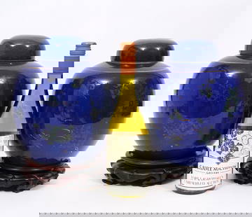 Pr. Cobalt Blue Chinese Ginger Jars on Stands: Pair of Chinese cobalt blue porcelain ginger jars with dome lids on open work wood stands. The jars are accented with gilt floral and leaves and have 4 blue character marks on the underside as well