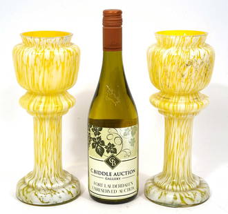 Pair of English Yellow Glass Hyacinth Vases: Pair of English hand-blown yellow and white glass Hyacinth vases. Measures 10.5"H x 4"W. Condition report: Very minor chips to rim on one vase, some remnants of paint, please examine all photos