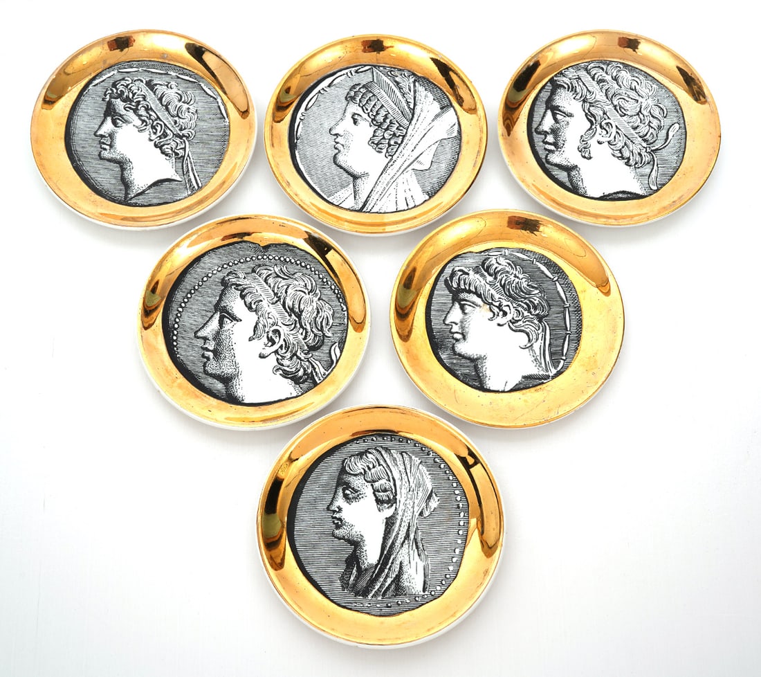 Set of 6 Fornasetti Roman Cameo Coasters: Set of 6 Piero Fornasetti gold rimmed Roman Cameo coasters marked on underside. Measures 4"W. Condition report: good condition, please see all photos. Contact C. Biddle Auction Gallery for more detail