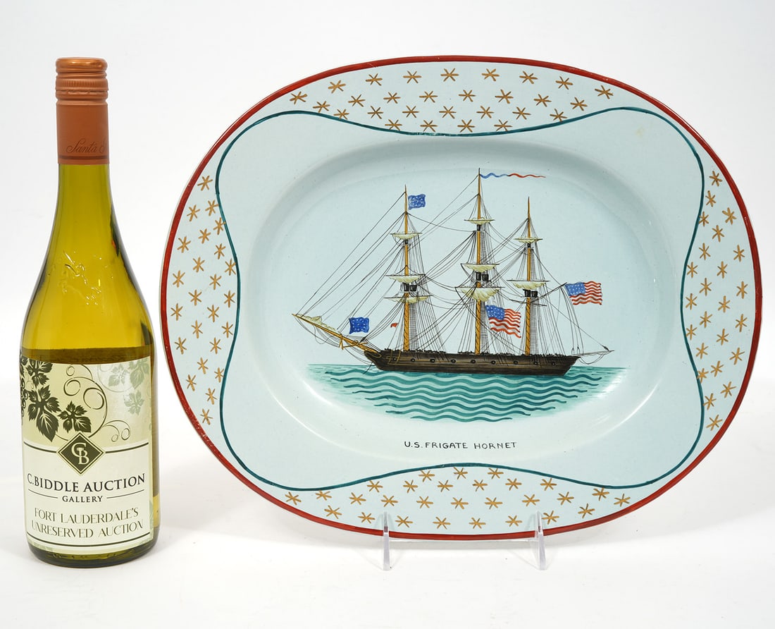 Mottahedeh Platter U.S. Frigate 'Hornet': Mottahedeh Bicentennial hand painted platter of the U.S. Frigate Hornet, limited edition No. 44, written on back. Measures 14.5"L x 11.75"W. Condition report: good condition, please see all photos. Co