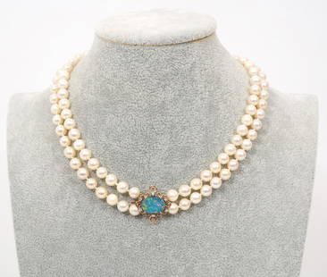 Double Strand Pearl Necklace Opal & Diamond Clasp: Double strand pearl necklace has veneered opal clasp set in a 14K yellow gold open work setting with 6 diamonds. Pearls measure 7mm each and strands are 15"L and 16"L. Condition report: good condition