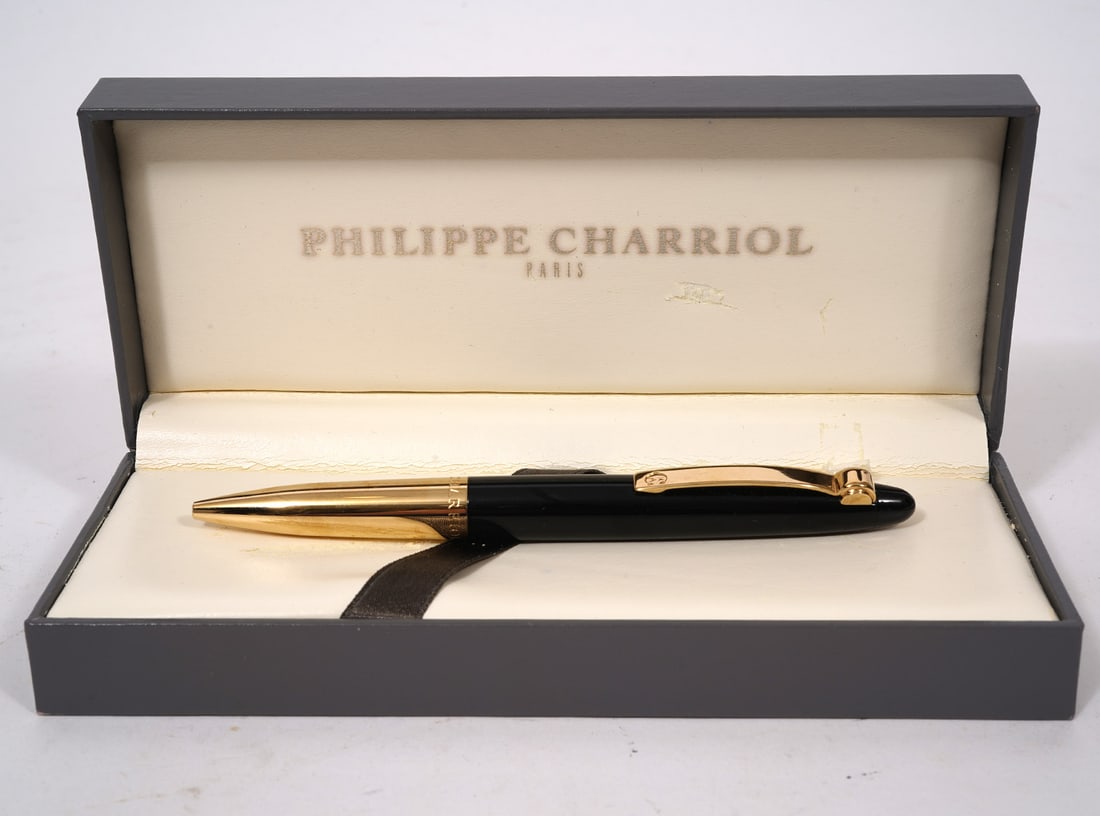Philippe Charriol 'Les Celtes' Pen: Philippe Charriol 'Les Celtes' ballpoint pen in black and gold includes original box, original tag, guarantee card and 2 booklets. Measures 5.25"L. Condition report: good condition, like new, please s