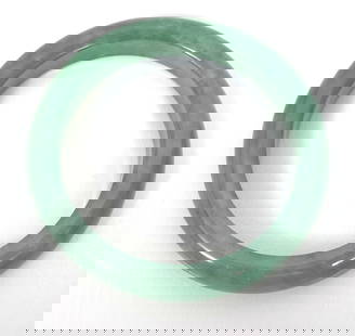 Chinese Jade Bangle: Chinese jade bangle (7" inner circumference), 1/2" width. Weight - 48.7g. Condition report: Good condition, please examine all photos closely. Contact C. Biddle Auction Gallery for more detailed infor