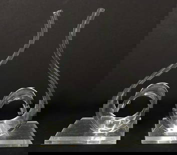 Pair of Scroll-Form Lucite Book Ends: Pair of scroll-form clear lucite book ends. Measures 4"L x 4.5"W x 8"H. Condition report: light scratches and scuffs, please examine all photos closely. Contact C. Biddle Auction Gallery for more deta