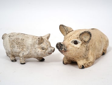 Two 'Pig' Cast Iron Coin Banks