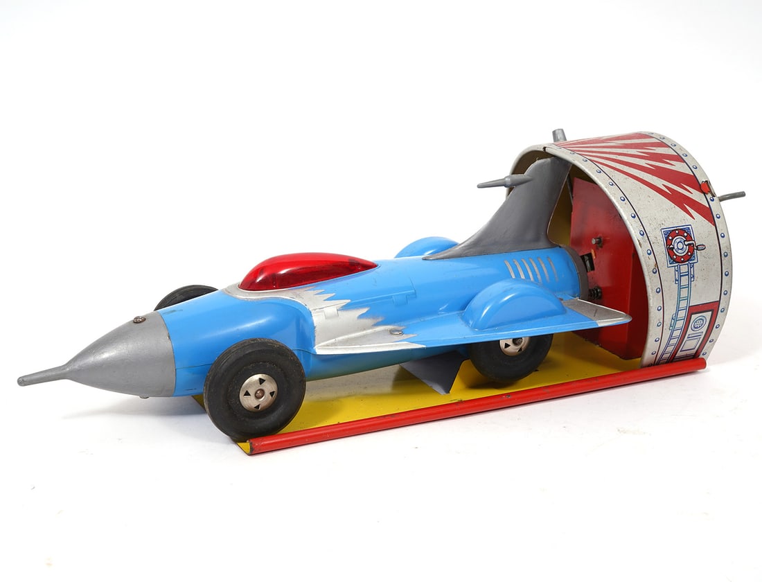 1950's Ideal Toy Co. Turbo Jet Car: 1950's Ideal Toy Co. turbo jet car has a wind up noise maker with spring loaded mechanism. Measures - 4.5"H x 13"L. Condition report: Good condition, please examine all photos closely. Contact C. Bidd