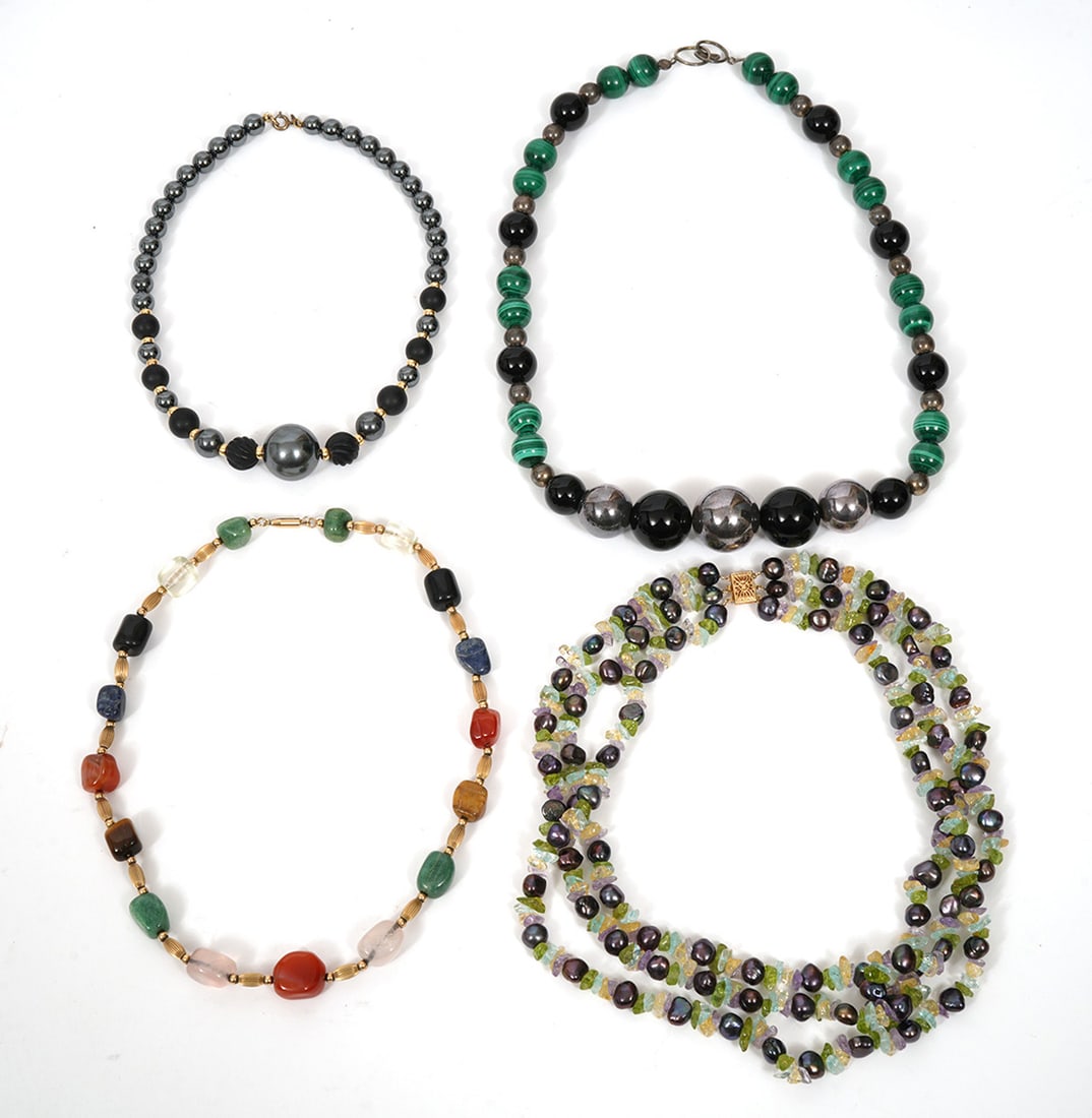 Assortment of 4 Beaded and Stone Necklaces: Assortment of 4 necklaces including malachite, onyx, corrugated yellow gold plated beads and stones, ranging in total length from 14" - 20". Condition report: good condition, please see all photos. Co