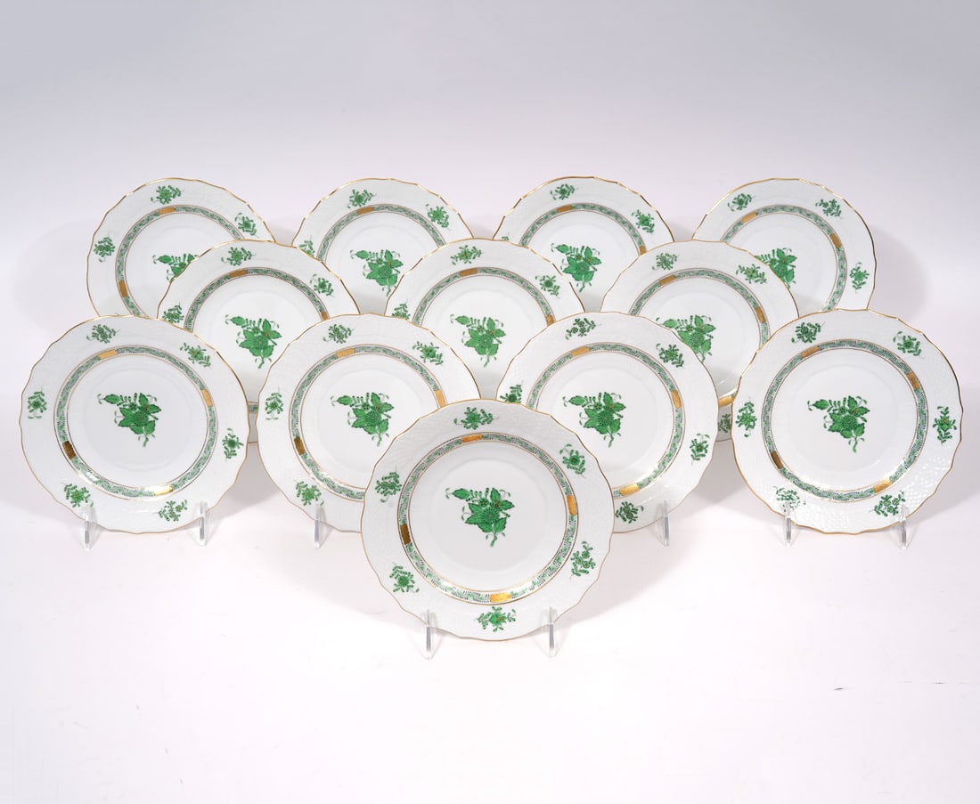 12 Herend Chinese Bouquet Green Salad Plates: 12 Herend Chinese Bouquet Green Salad Plates features a center motif of a stylized peony surrounded by a garland of leaves with 24K gold trim and accents. Marked on back 1518/AV and measures 7.5"W. Co
