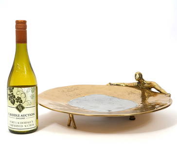 David Marshall Brutalist Brass & Aluminum Platter: David Marshall, Scotland (Born 1942). Brutalist brass and aluminum platter has an aluminum center surrounded by brass and features a human form holding up one end. Signed and numbered, 29/100, etched