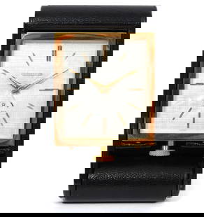 Jaeger-LeCoultre Tiffany & Co Travel Clock: Jaeger-LeCoultre Tiffany & Co brass travel clock in folding black leather case. Overall Measures 4.25"L x 2.5"W x 1"H (folded). Condition report: AS-IS, this item has not been tested for functionality