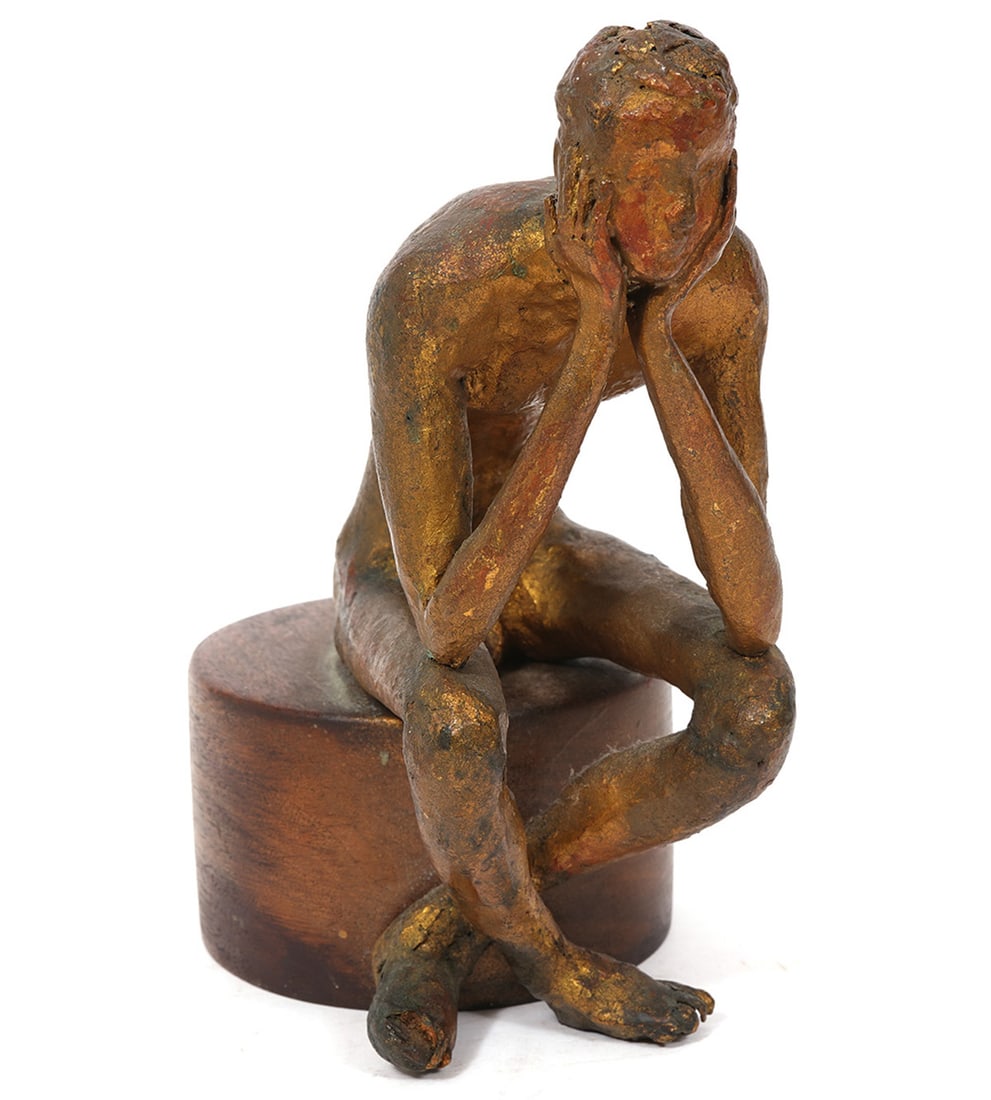 Signed Carved Wood Pensive Seated Figure: Painted and carved wood sculpture, signed Walt Haynes at top of base, dated 1957. Features a nude seated man with an elongated body, in a pensive and contemplative pose. Measures 6"L x 4"W x 7.5"H. Co