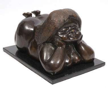 Emilio Anzola Female Figure Bronze S/N: Emilio Anzola, cast bronze sculpture of a rubenesque female figure lying down. Mounted on black slate base and signed and numbered (3/200). Measures 20.5"L x 13.5"W x 12"H. Condition report: Good cond
