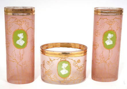 Group of Three Bohemian Style Glass Vases: Group of three Bohemian-style enamel over pink frosted glass vases. Includes, pair of tall pieces (8.5"H x 3.25"W) and short oval vase ( 5.5"L x 4.25"W x 4"H). Condition report: Common surface wear fo