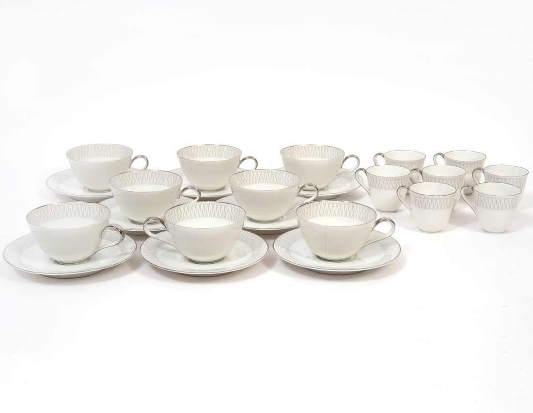 H&C Heinrich Monarch Cups & Saucers Set 23Pc: H&C Heinrich Monarch demitasse cup and saucer set includes 8 flat coffee/tea cups (2.25"H x 5"W), 8 matching saucers (6"W), and 7 demitasse cups (2.25"). Condition report: Chip to one cup, please see