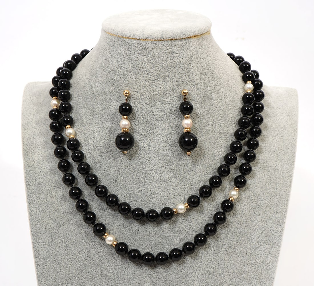 Onyx Beads & Pearls 14K Necklace & Earrings: Matching set of onyx beads and pearls with 14K yellow gold spacers. Necklace is 40" long and earrings are 2" long. Condition report: Good condition, please examine all photos closely. Contact C. Biddl
