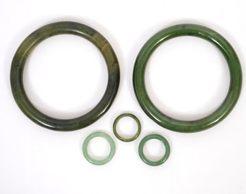 Two Jade Bangle Bracelets Three Jade Rings