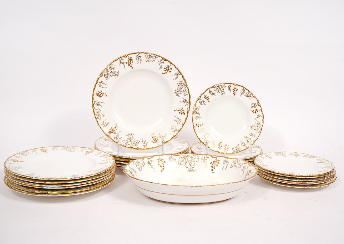 25 Pieces Royal Crown Derby Vine Gold China: 25 pieces of Royal Crown Derby Vine Gold China includes 12 salad plates 8.75''W; 12 bread plates 6.25''W; and 1 serving bowl 10’’W x 7.5’'H. Condition report: Bottom of serving bowl is stained, 