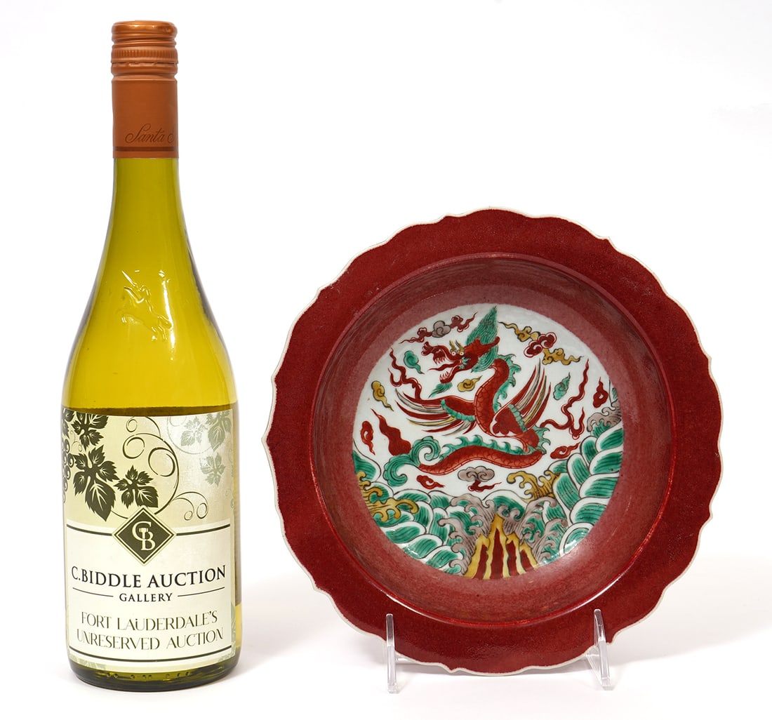 Chinese Red Dragon Motif Signed Bowl: Chinese red dragon motif porcelain bowl, six blue character marks on underside. Measures 2"H x 8.5"W. Condition report: Good condition, please see all photos. Contact C. Biddle Auction Gallery for mor